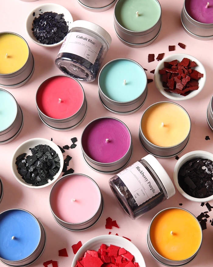 Candles colored with dye flakes