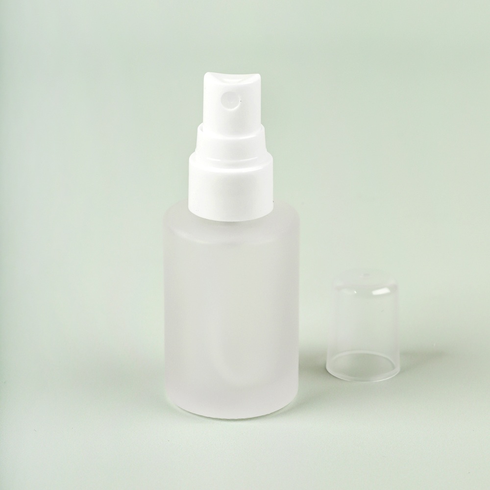 1 oz Frosted Glass Bottle with White Spray Top image number null